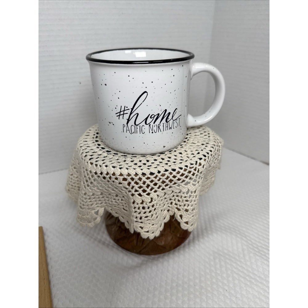 # Home Pacific Northwest Mug. Ceramic White With Black Speckles Black Rim.